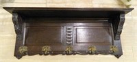 Foliate Carved Dark Oak Wall Rack.