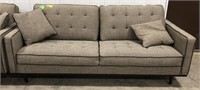 Upholstered sofa with 2 matching pillows