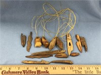 Bag of St. Lawrence Island artifacts, fossilized i