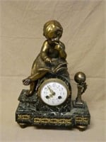 Figural Bronze Clock on Marble Base.