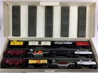 (12) Lionel Train Cars W/ Storage Box