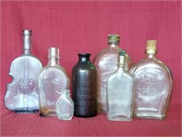 7 pcs. Antique Whiskey & Elixir Bottles