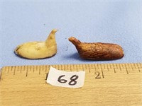 Lot of 2 ancient, fossilized ivory carved birds, g