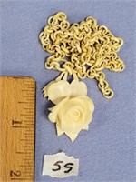 A very unique all ivory necklace, carved ivory ros