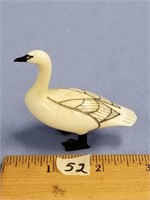 An outstanding core ivory carving of a swan by T.