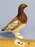 Core ivory carving of a willow ptarmigan, in seaso