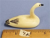 Older, core ivory carving of a swan, by Peter Maya
