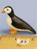 Core ivory carving of a puffin, by Peter Mayac, sc