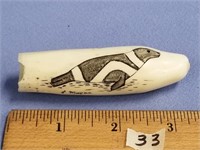 Scrimmed whales tooth, by Larry Mayac of a ringed