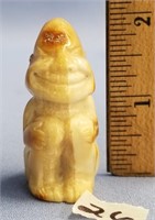 2" fossilized core ivory carving of a Billiken sty
