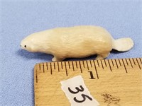 Fossilized ivory carving of a beaver, by Sincyke,