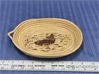An interesting grass tray, woven with twine, has d