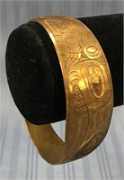 Outrageous copper cuff bracelet, Tlingit bear engr