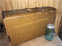 Antique hardside houndstooth suitcase