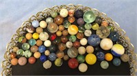 Group of vintage marbles including clay, a glass