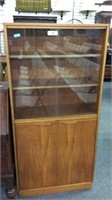 MID CENTURY TALL BOOKCASE WITH SLIDING GLASS DOORS