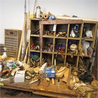 Contents of work bench & wood next to bench