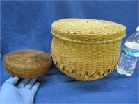 2 vintage hand woven baskets with lids