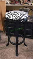 Black barstool with zebra seat, 29 inch seat