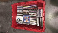 Flip top lid crate full of CDs, (424)