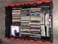 Crate with flip top lid full of CDs, (424)