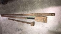Two wooden antique plungers and another wood tool