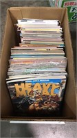 Box of heavy metal and other adult comic books