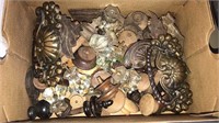 Box of antique drawer and door knobs, some glass,