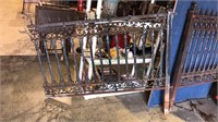 Fancy wrought iron fence section with one post,