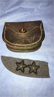 Military leather ammo pouch with a brass clip,