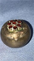 Sterling ring box with eight garnets on top, one