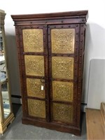 Armoire with metal panels