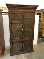 Armoire with metal panels