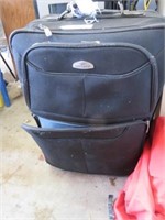 ROLLING SUITCASE WITH CONTENTS