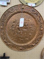 Round, copper decorative wall hanging
