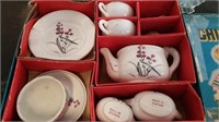 CHINA SET WITH MUSICAL DOLL