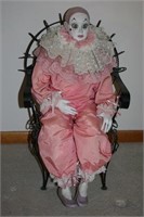 Porcelain Jester in Wire Peacock Back Chair