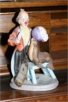 Arnart Porcelain Clown with Seal Figurine