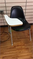 Black leather like molded desk chair with flip up