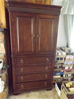 ENTERTAINMENT CENTER W/ FOUR DRAWERS