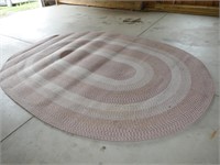 OVAL BRAIDED RUG- FEW BURN HOLES FROM FIRE PLACE