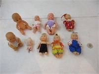Neuf  petites poupées de collection vtg