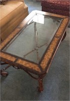 Western Motif Glass and steel Coffee table