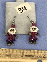 Pair of adorable beaded, dangle earrings, of a gir