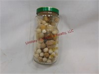Jar of antique clay marbles