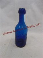 Blue bottle marked P. Conway Bottler