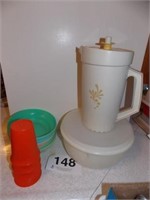 Tupperware: pitcher w/ seal - mixing bowl w/seal -