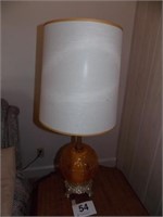 Pair of amber globe lamps w/wooden pole