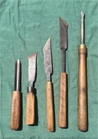 Four hand-forged lathe chisels