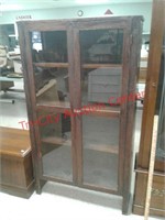 Antique glass front cabinet with 4 shelves 31"